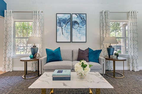 a living room with a couch and a table