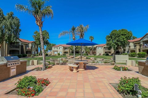 A sunny day at the outdoor patio of a residential area.