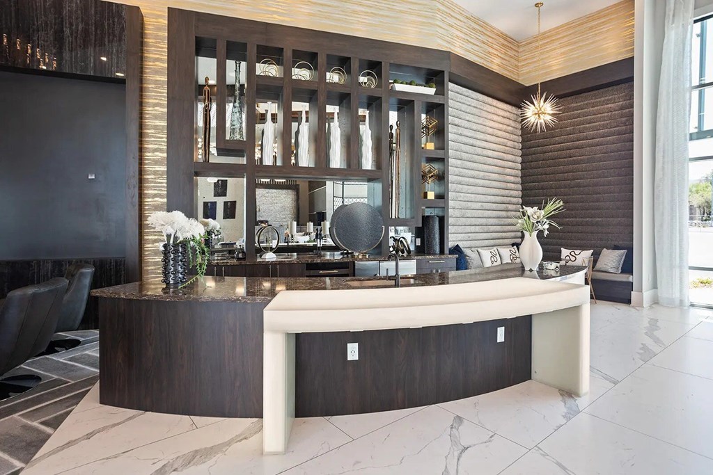 A reception area with a white bench and a dark brown cabinet.