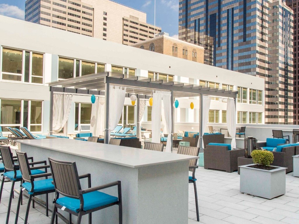 The furnished sky deck provides cozy spaces for getting together with friends