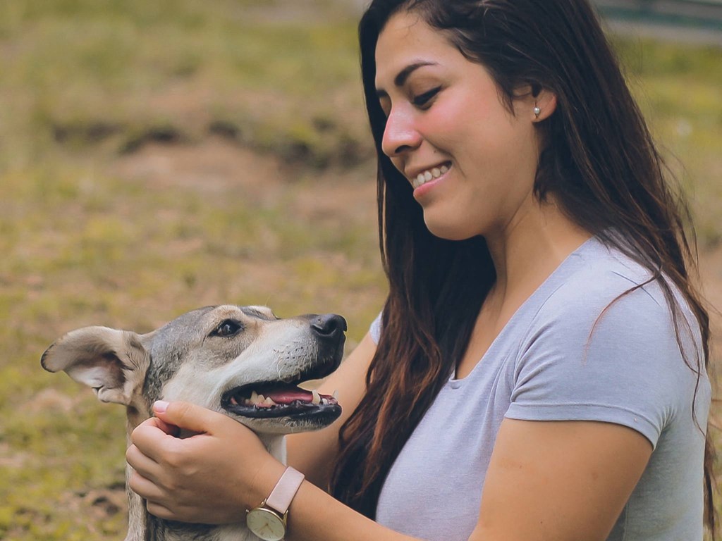 A Kardon Atlantic resident enjoys time outdoors with her dog