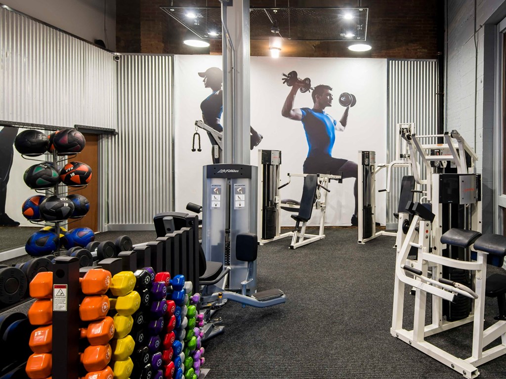 A variety of strength-training equipment in Kardon Atlantic’s gym