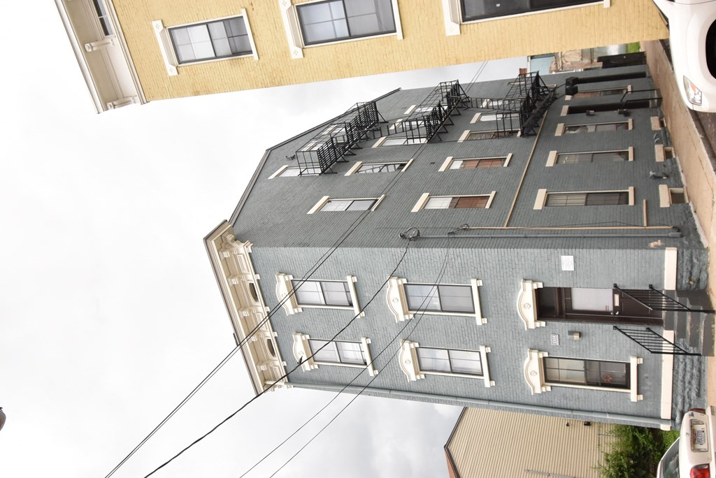 an overhead view of an apartment building with balconies