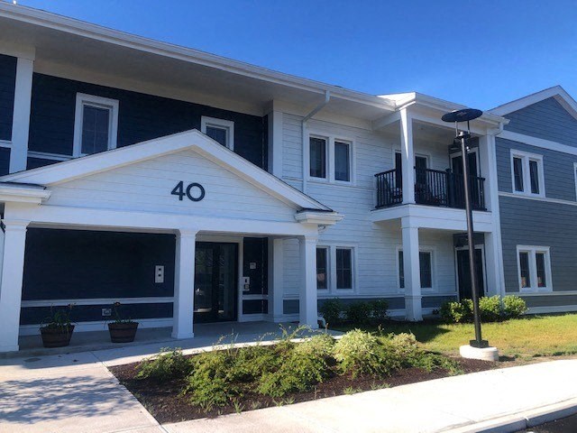 a large white building with a black number 40 on it