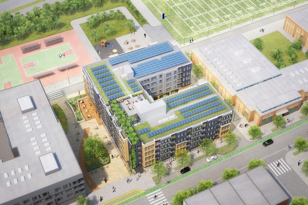 an aerial view of an office building and other buildings in a city