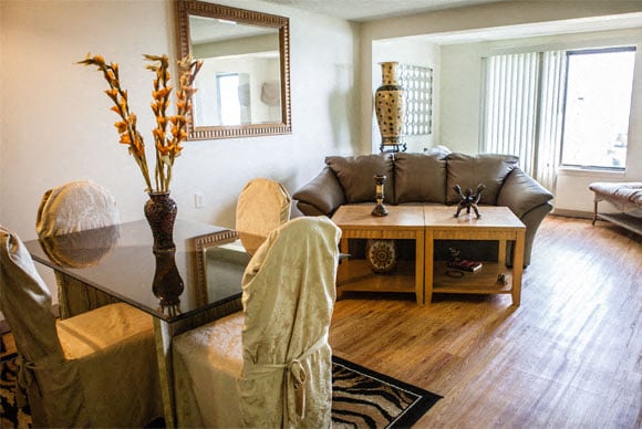 a living room with a couch and a table