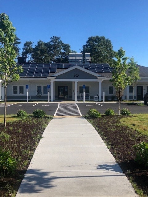 a building with solar panels on the roof