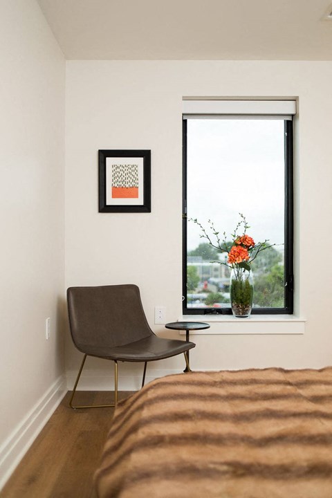 Chair in a corner, next to a window