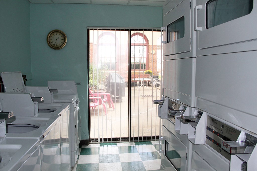 an empty kitchen with a door to a patio