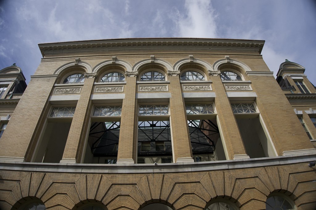 the facade of a building with a row of windows