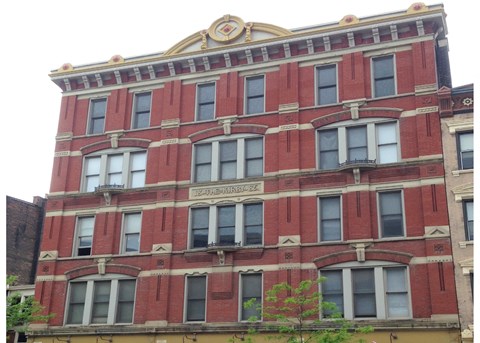 A red brick building with a sign that says "Telegraph".