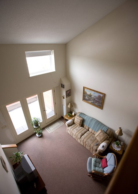 an overhead view of a living room with a couch