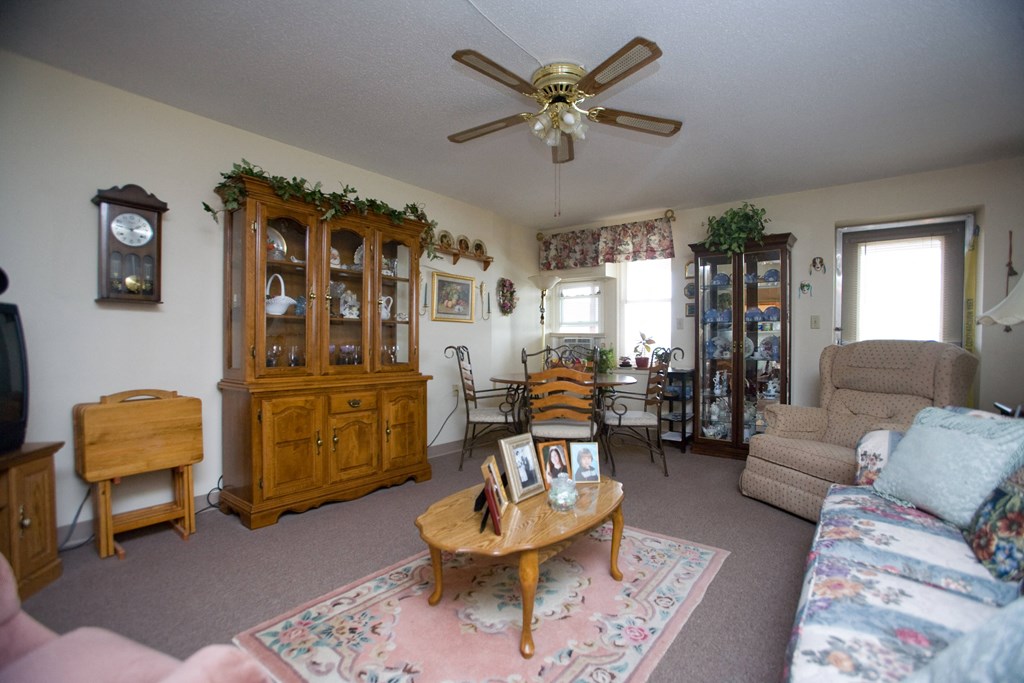 a living room with a couch and a table