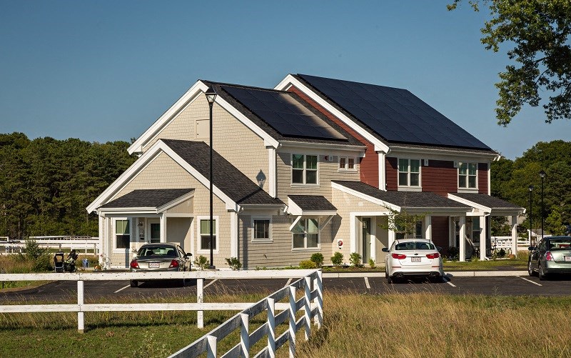 a house with solar panels on the roof