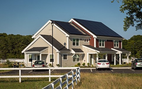 a house with solar panels on the roof