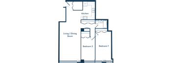 A floor plan of a house with a kitchen, living/dining room, and two bedrooms.