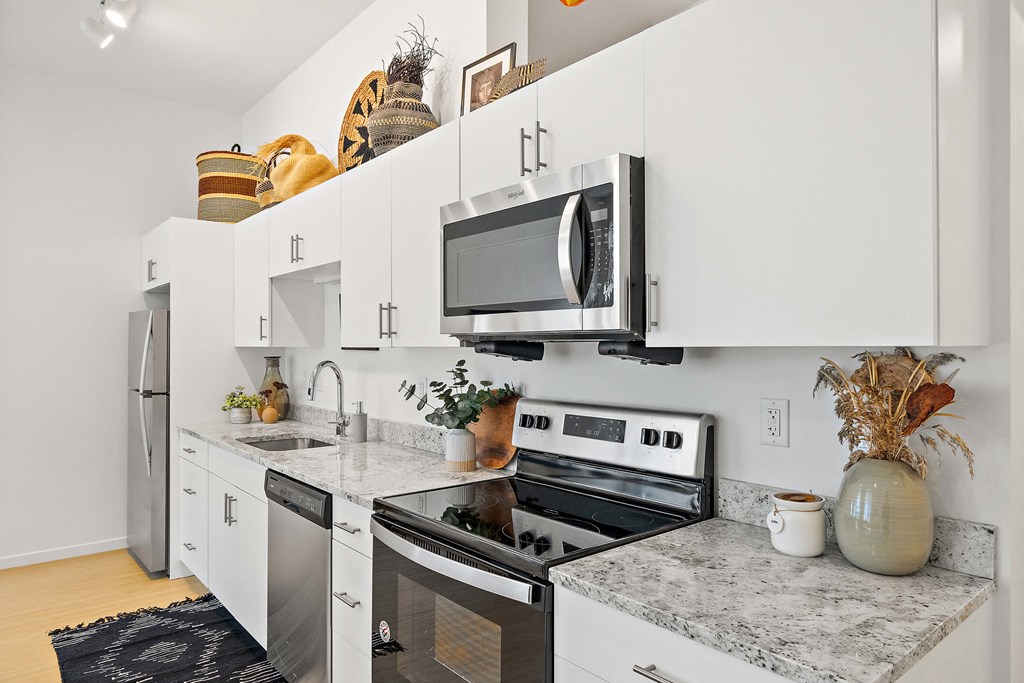 Kitchen with appliances and White cabinets  at The Freelon at Sugar Hill, Detroit, Michigan 48201