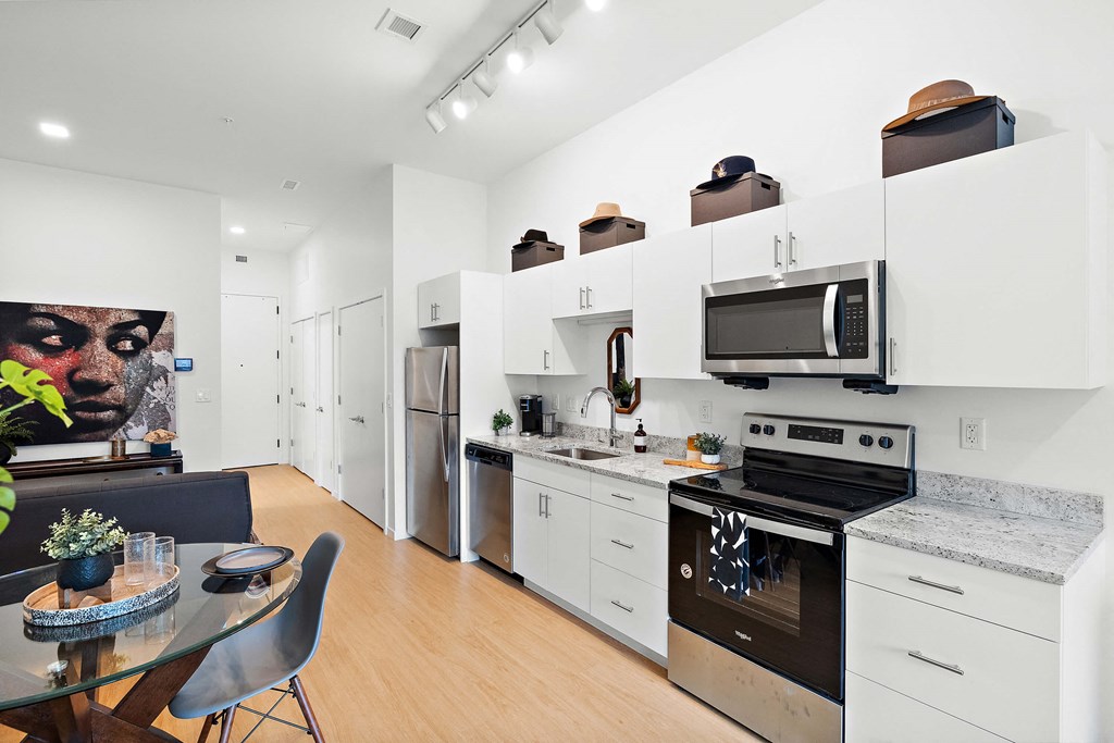 Kitchen with appliances at The Freelon at Sugar Hill, Detroit, MI 48201