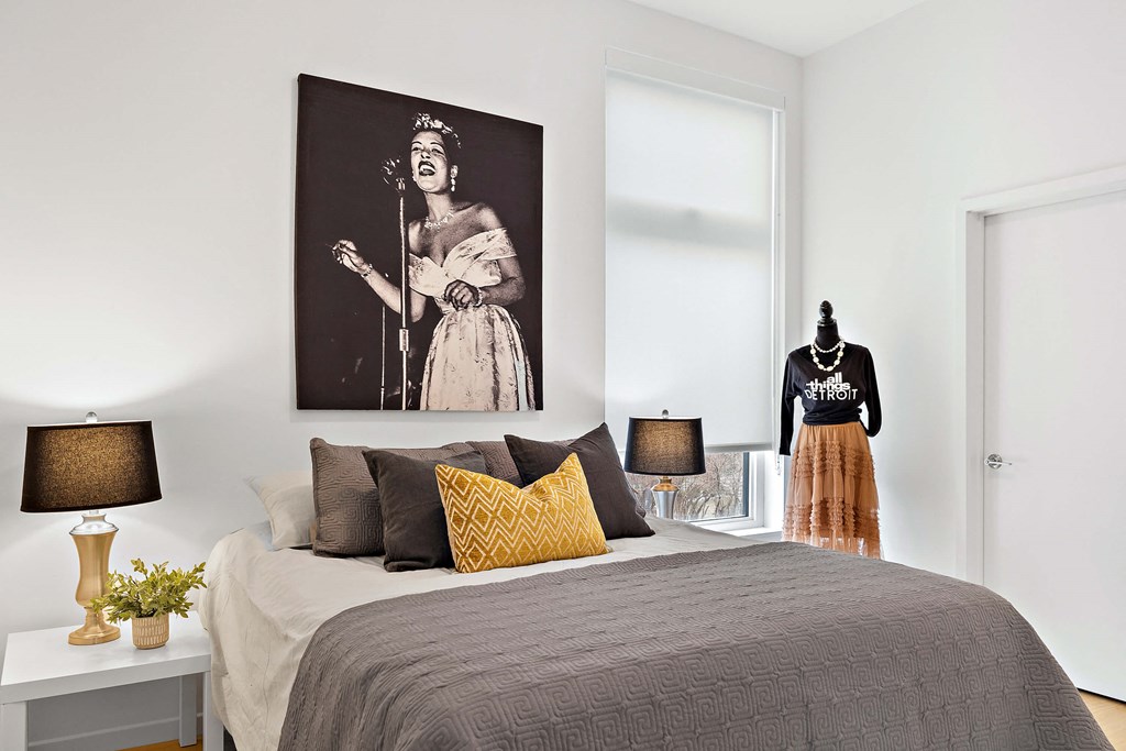 Bedroom with cozy bed at The Freelon at Sugar Hill, Detroit, MI, 48201