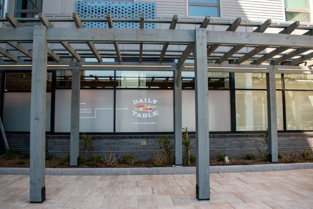 a building with a glass facade and a sign that reads dalry factory