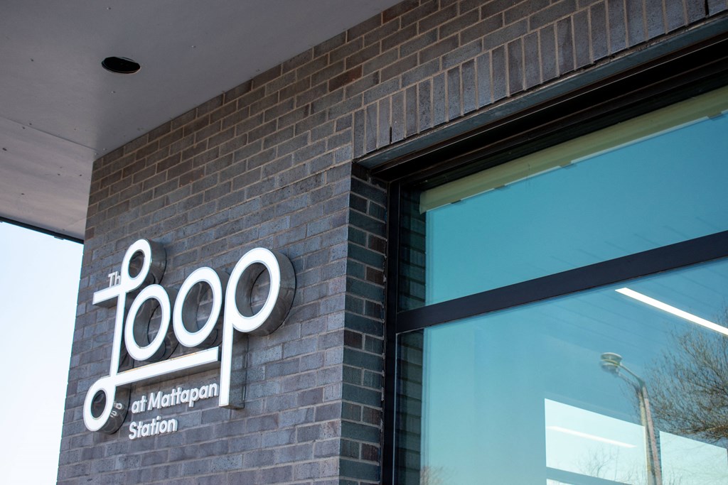 a building with a sign on the side of it