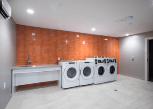 A laundry room with a washer and dryer.