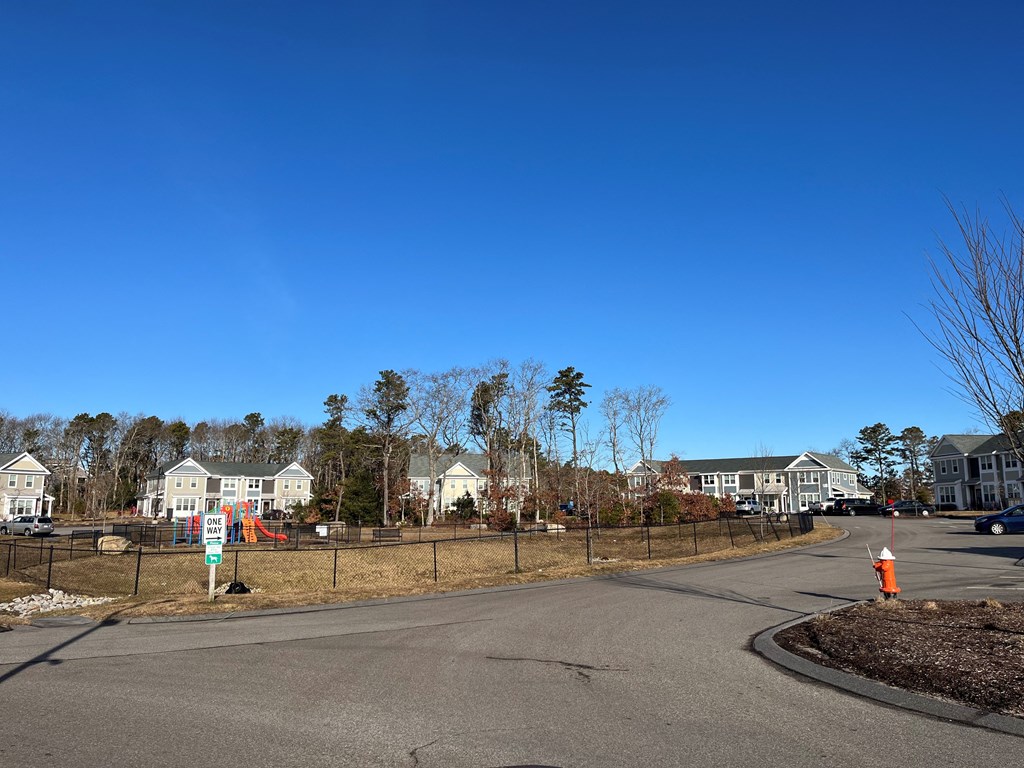 a street with houses on the side of a road