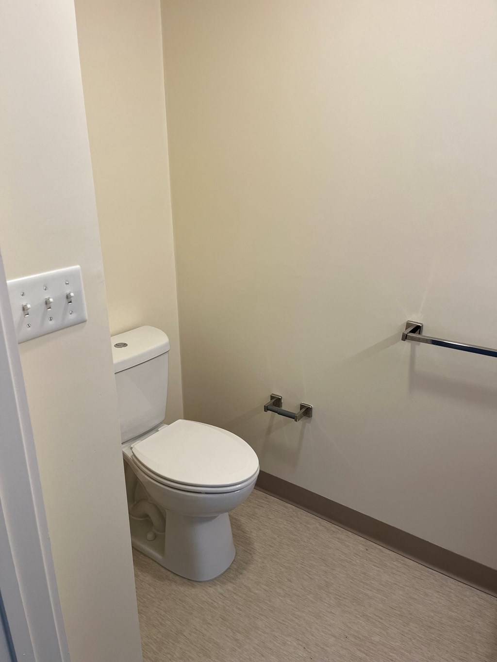 a small bathroom with a toilet and a shower