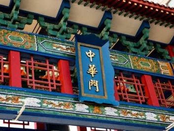 a blue sign on the side of a building