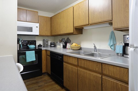 Kitchen with lots of cabinet space at Claremont Apartments in Minnetonka, Minnesota