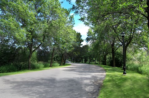 Apartments set in a nature preserve with beautiful scenic views and 6 miles of walking trails at Claremont Apartments in Minnetonka Minnesota.
