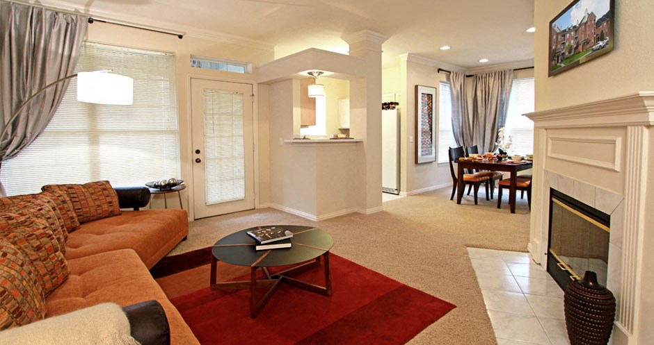 Spacious luxury apartments with woodburning fireplace, spacious dining room, and oversized windows at The Biltmore Apartments in Omaha, Nebraska