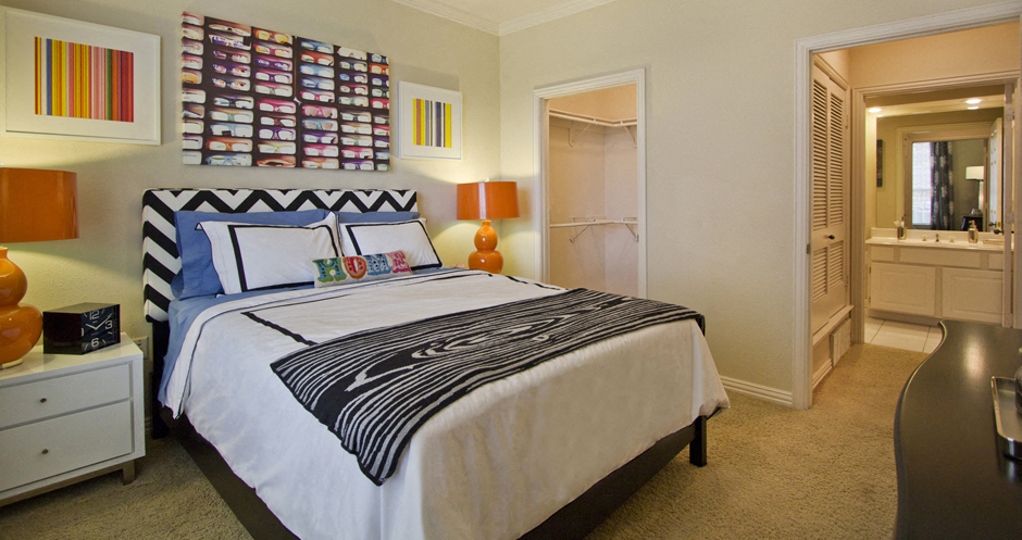 Spacious bedroom with walk-in closet and bathroom at The Biltmore Apartments in Omaha, Nebraska