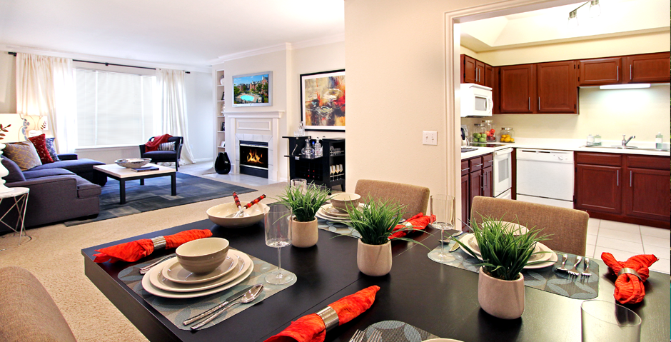 Luxury apartments with spacious layout, spacious floor plan, woodburning fireplace, oversized windows, and u-shaped kitchen at The Biltmore Apartments in Omaha, Nebraska