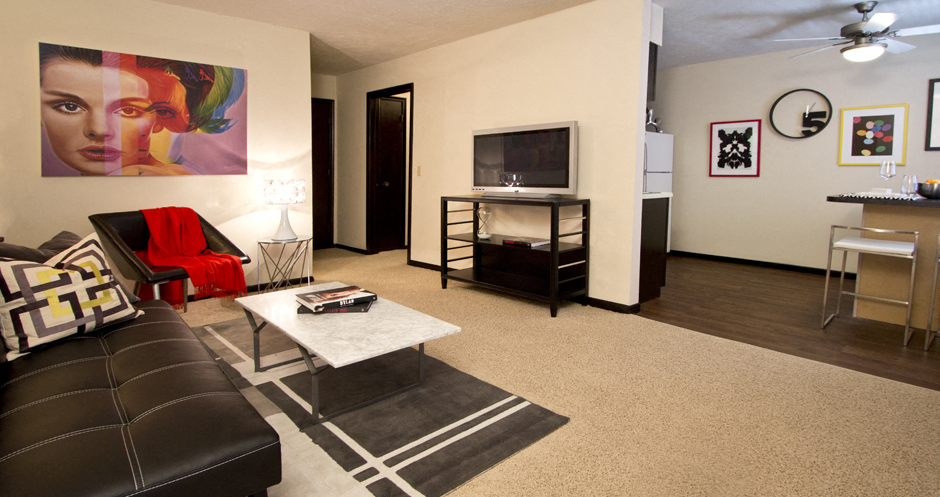 Apartments in central Omaha with spacious living room and dining room at Kensington Woods Apartments