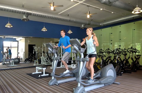 Apartments set in a nature preserve with huge fitness center at Claremont Apartments in Minnetonka Minnesota.