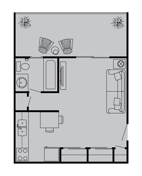 A floor plan of a small apartment with a kitchen, living room, and bathroom.