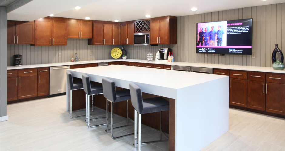 Luxury resident clubhouse with free wi-fi, resident kitchen, resident lounge, and meeting room at Alpine Village Apartments in La Vista, Nebraska