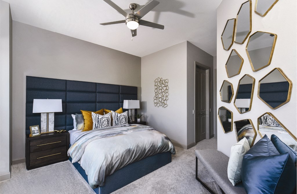 Luxury apartments with master bedroom to fit a king size bed, attached master bathroom and walk-in closet at Xenia Apartments in Golden Valley, Minnesota