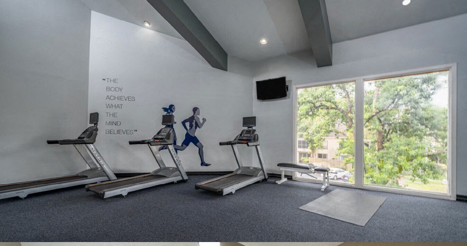 Apartments conveniently located in the Bayou area of Houston with a huge fitness center with separate weights and cardio areas.