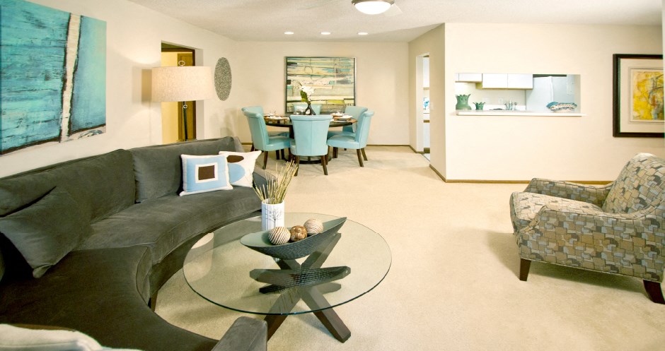 Huge apartment, spacious floor plan, spacious kitchen, spacious dining room, spacious living room, and bright white kitchen at The Vanderbilt Apartments in Omaha, Nebraska