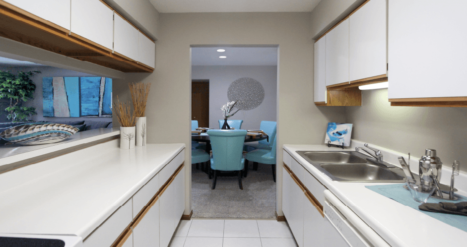 Kitchen with lots of cabinet space, lots of counter space, and spacious dining room, at The Vanderbilt Apartments in Omaha, Nebraska