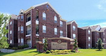 Luxury apartments located next to Rockledge shopping center with red brick exterior and scenic views