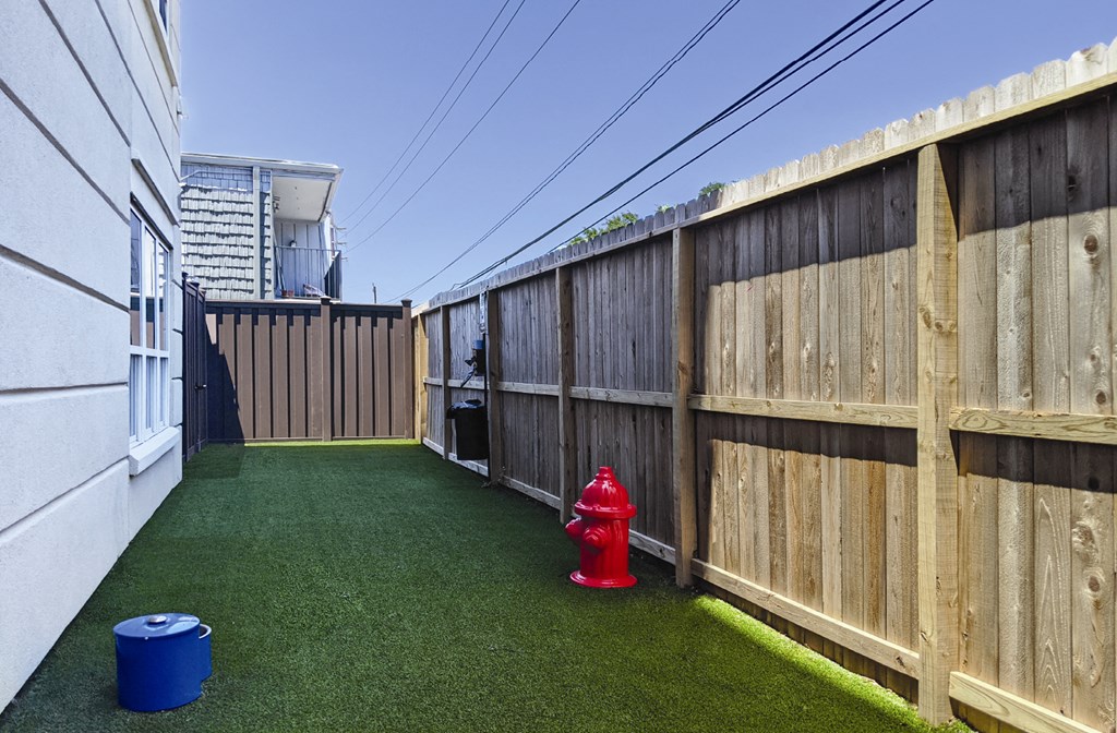 Luxury apartments with puppy palazzo, dog park, dog yard, at Tuscany Walk Apartments in Houston.