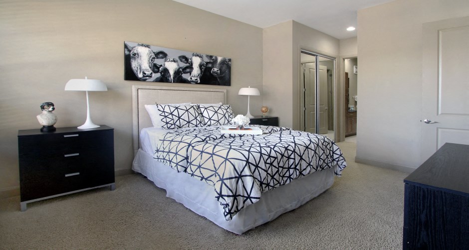 Luxury apartments with master bedroom to fit a king size bed, attached master bathroom and walk-in closet at Bellemeade Apartments in west Des Moines