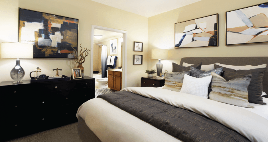 Luxury apartments with large master bedrooms to accommodate king-size beds, attached master bathroom and walk-in closet at The Voss Apartments in Houston.