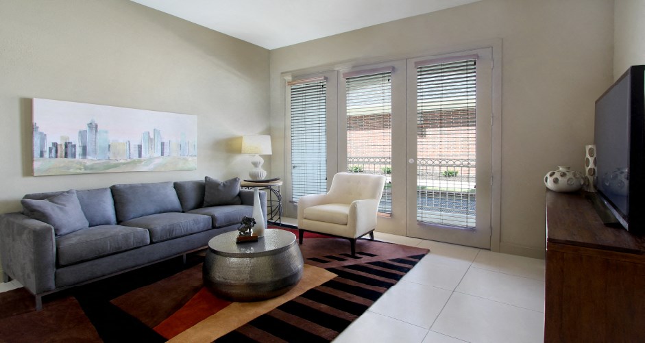 Luxury apartments with spacious open floor plan, porcelain tile floors, and oversized windows at Bellemeade Apartments in west Des Moines