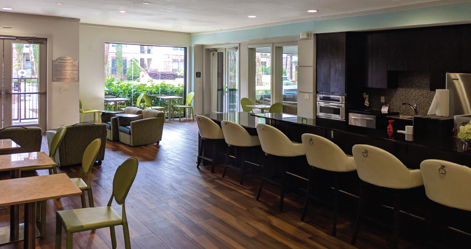 Luxury apartments with coffee bar, cyber café, resident lounge, and resident game room at The Voss Apartments in Houston.