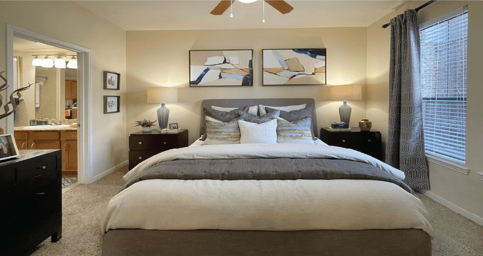 Luxury apartments with large master bedrooms to accommodate king-size beds, attached master bathroom and walk-in closet at The Voss Apartments in Houston.