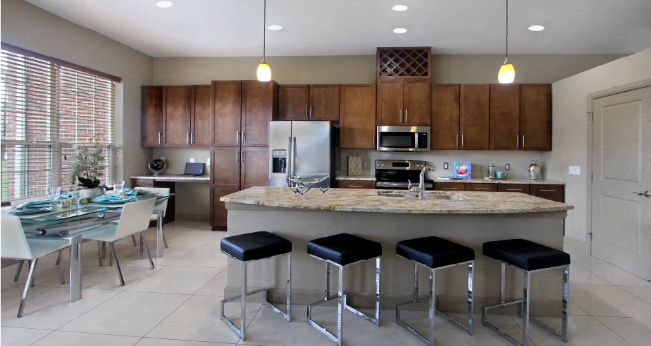 Luxury apartments with spacious kitchen, granite countertops, stainless steel appliances, built-in wine rack, kitchen island, front-loading washer and dryer and porcelain tile floor at Bellemeade Apartments in west Des Moines